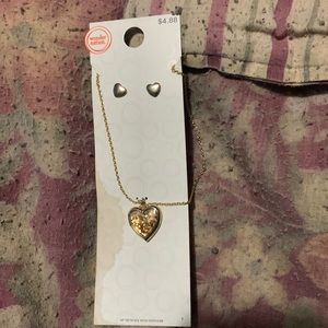 Heart shaped locket necklace with matching earrings